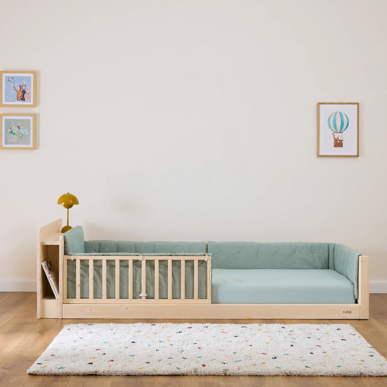 Gepolsterte Kopfteilstütze und Rausfallschutz für zero+ Fun