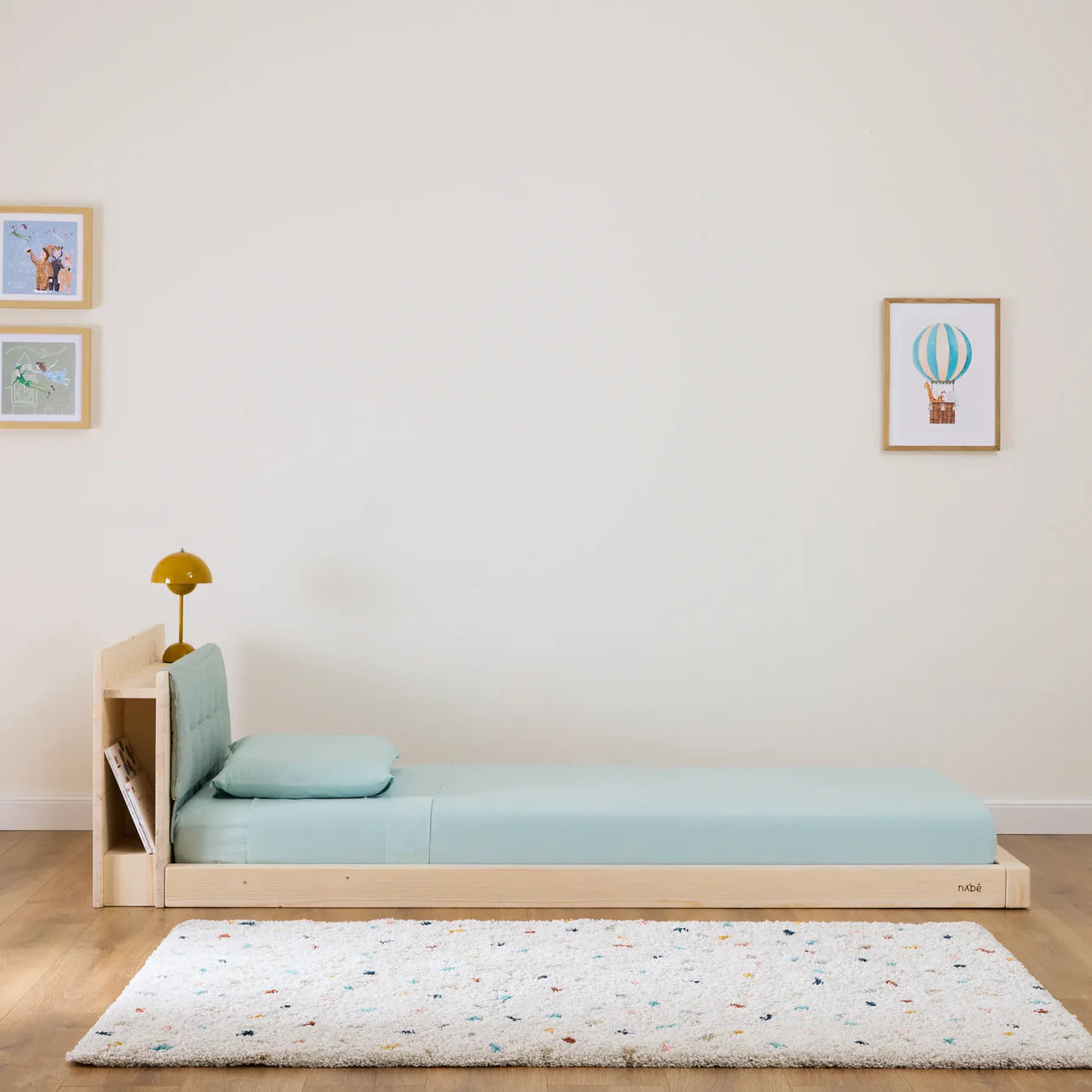 Gepolsterte Kopfteilstütze und Rausfallschutz für zero+ Fun